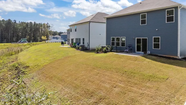 a view of a house with swimming pool