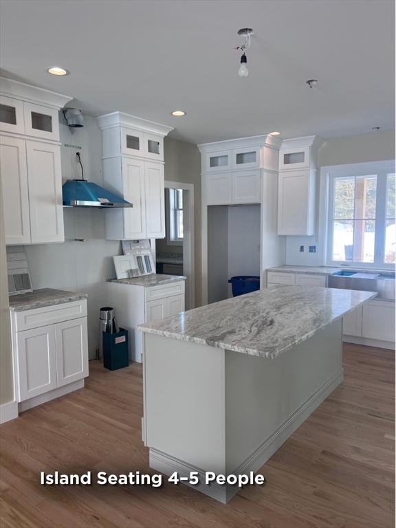 337 Chicopee Street, Unit LOT 8 Granby, MA 01033 - Photo 13 of 21 a kitchen with stainless steel appliances granite countertop a sink stove and refrigerator