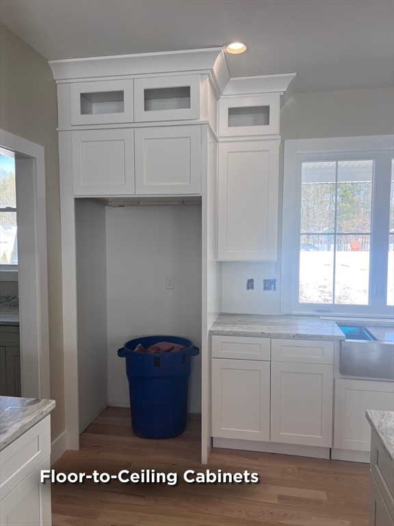 337 Chicopee Street, Unit LOT 8 Granby, MA 01033 - Photo 14 of 21 a kitchen with a cabinets and window