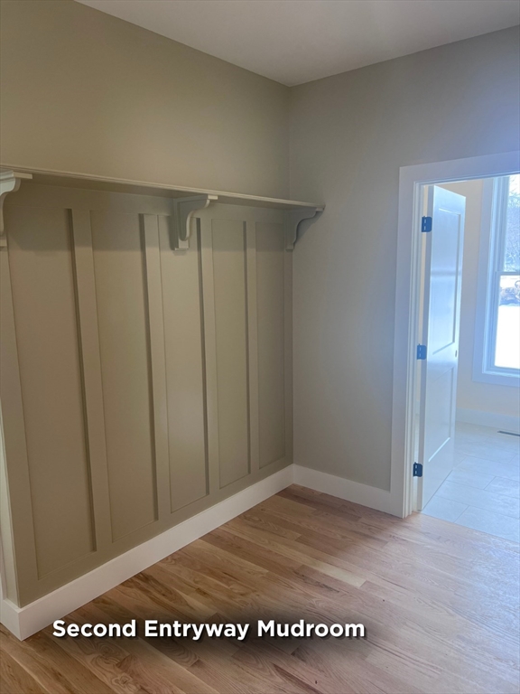 337 Chicopee Street, Unit LOT 8 Granby, MA 01033 - Photo 5 of 21 a view of a hall with wooden floor