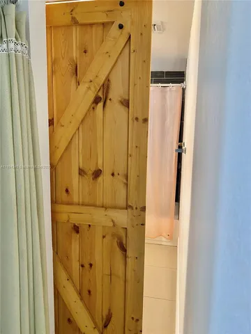 a view of small space with racks on the wall