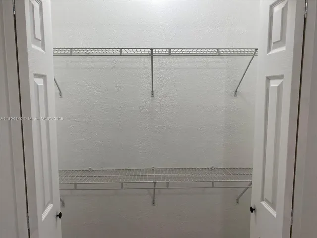 en empty room with a window