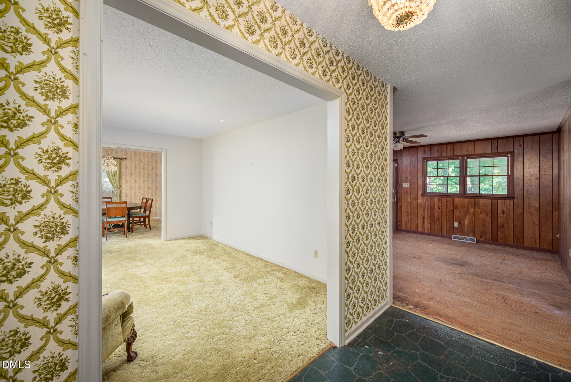 4411 Rhew Drive Durham, NC 27704 - Photo 8 of 34 wooden floor in an empty room with a window