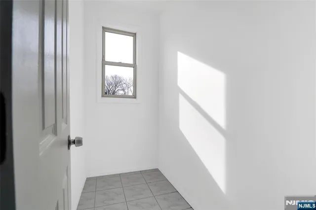 a view of an entryway with window