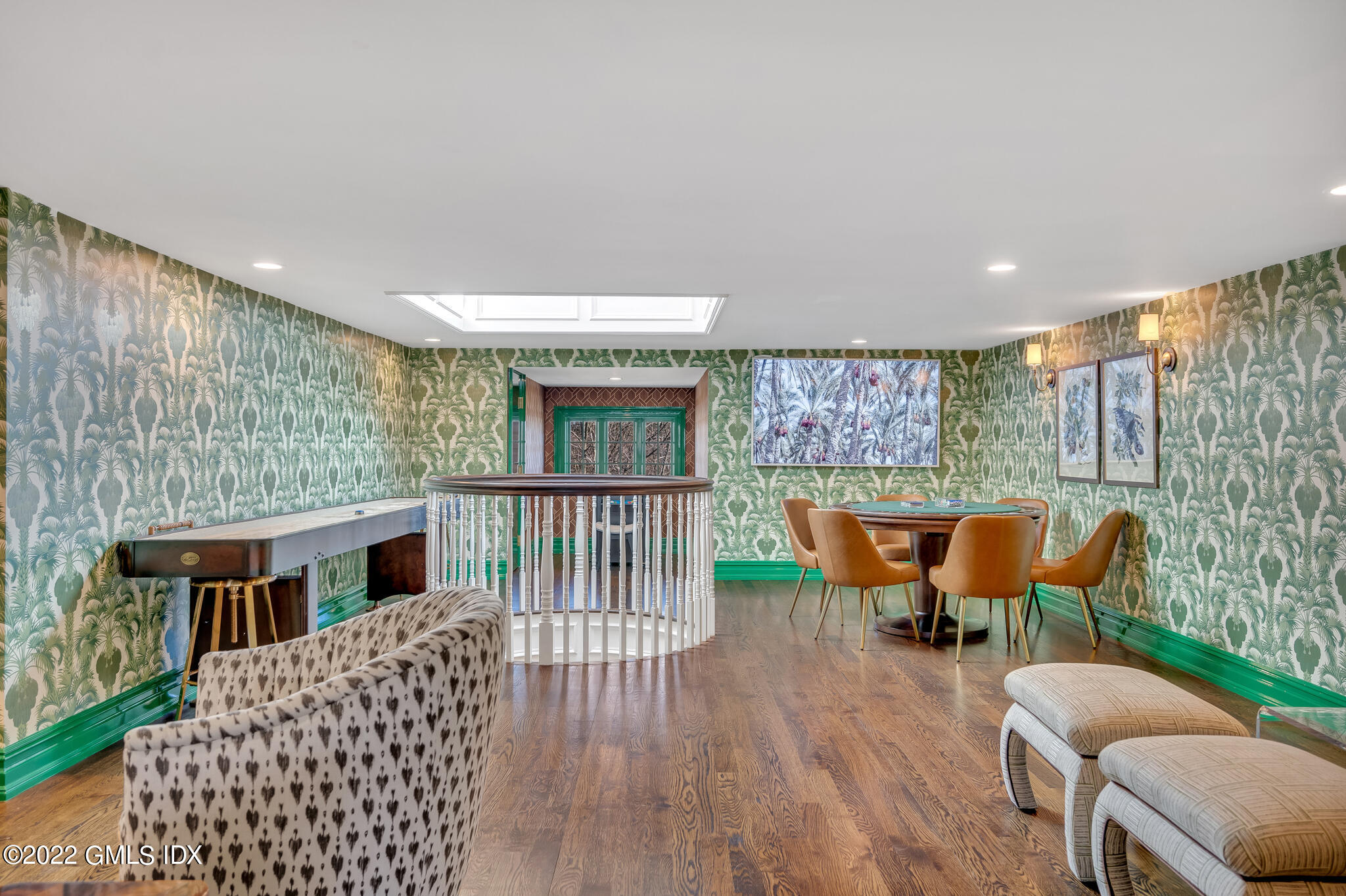 21 Woodside Drive Greenwich, CT 06830 - Photo 24 of 35 a balcony with furniture and wooden floor