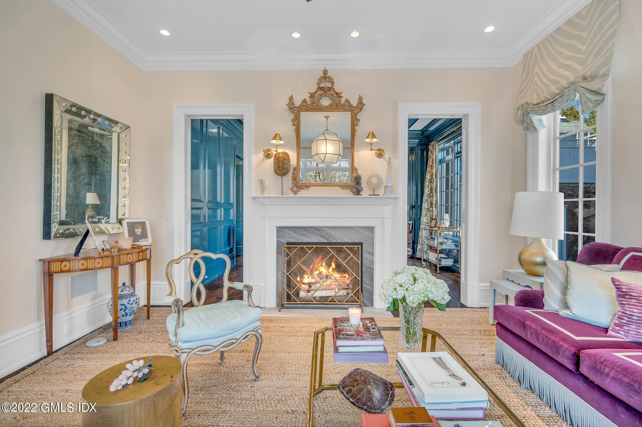 21 Woodside Drive Greenwich, CT 06830 - Photo 3 of 35 a living room with furniture and a fireplace