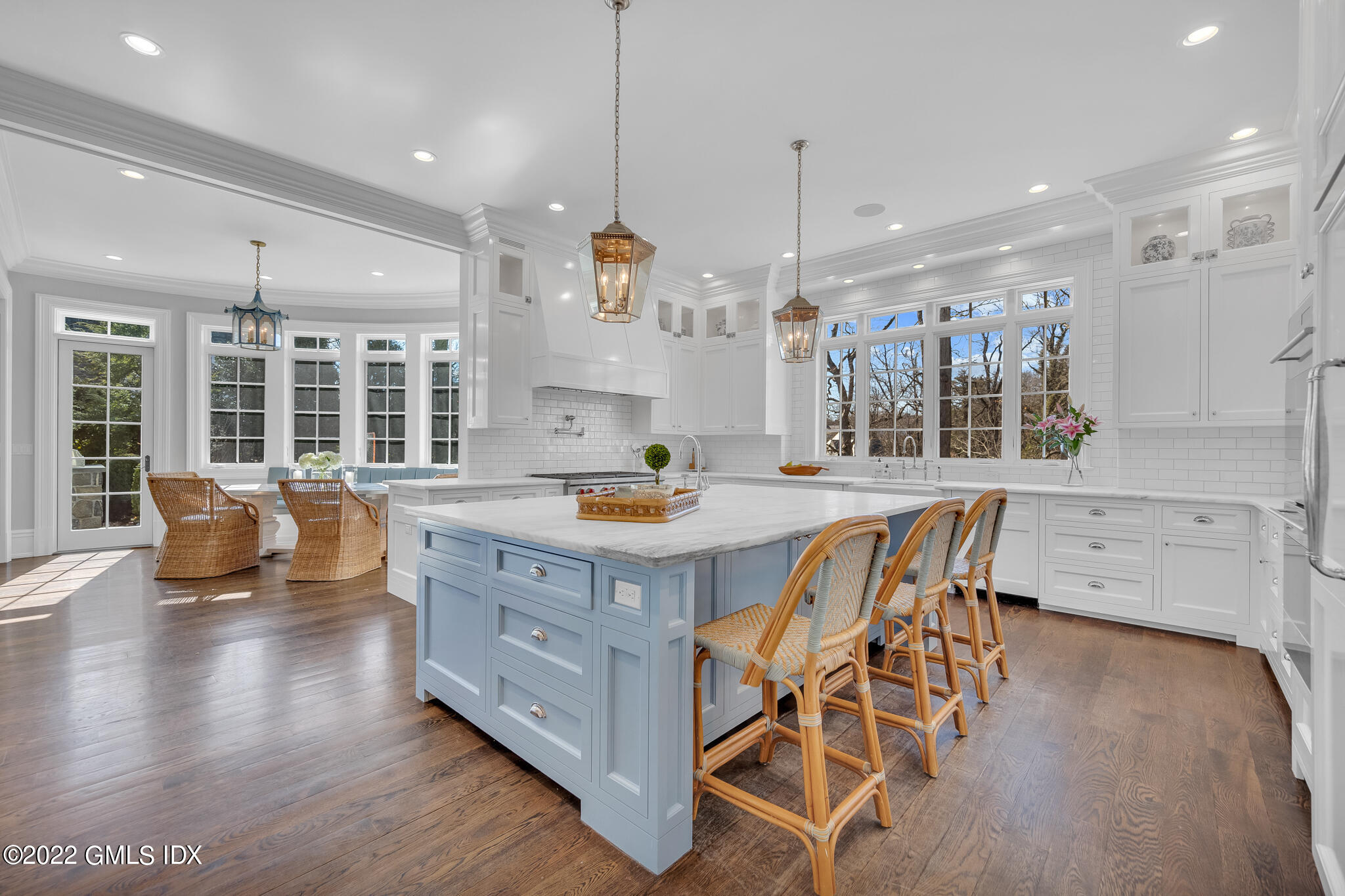 21 Woodside Drive Greenwich, CT 06830 - Photo 8 of 35 a kitchen with stainless steel appliances granite countertop a stove and a wooden floors
