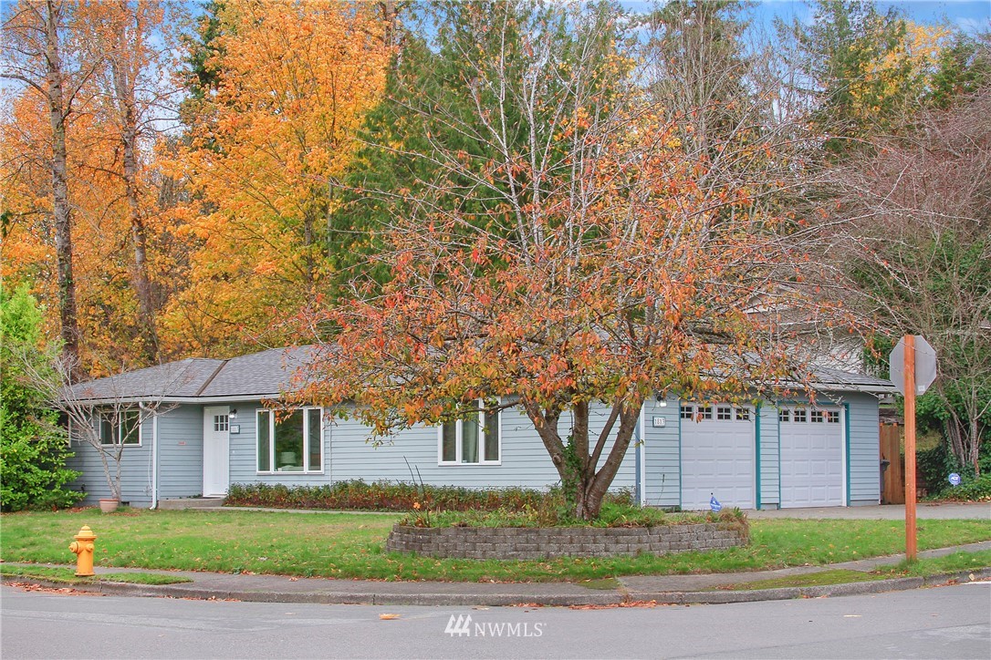 1813 Aberdeen Avenue Southeast Renton, WA 98055 - Photo 17 of 22 a front view of a house with yard and trees