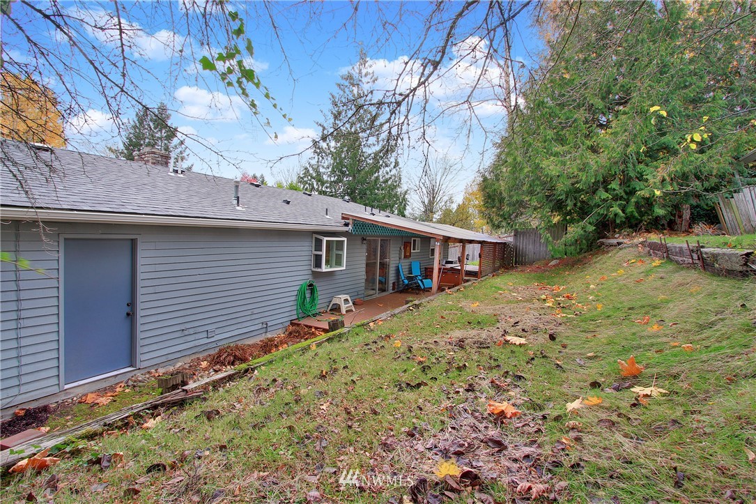 1813 Aberdeen Avenue Southeast Renton, WA 98055 - Photo 18 of 22 a view of a house with a yard