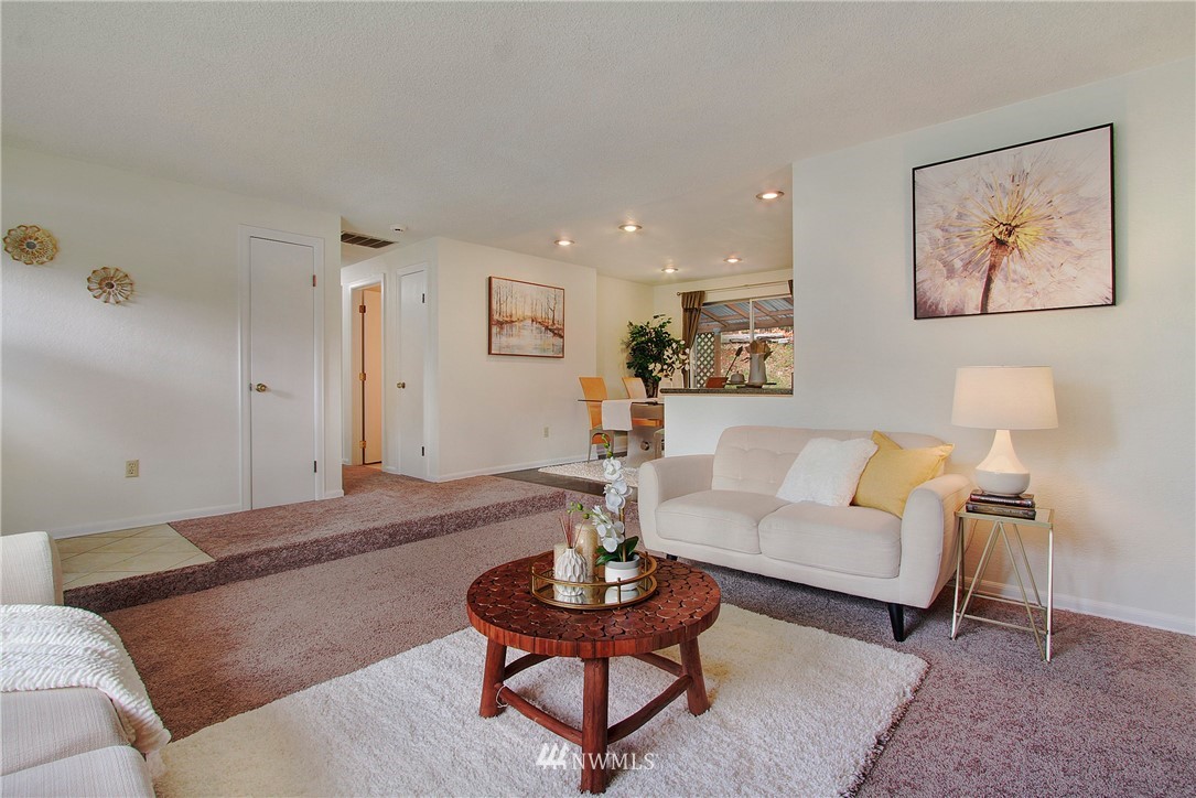 1813 Aberdeen Avenue Southeast Renton, WA 98055 - Photo 6 of 22 a living room with furniture a rug and a painting