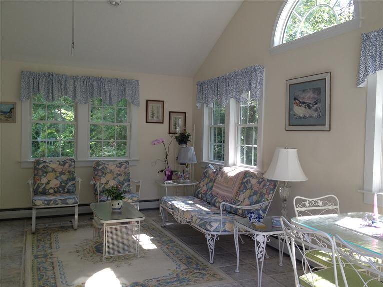 54 Ansel Howland Road Centerville, MA 02632 - Photo 5 of 19 a living room with furniture and a window