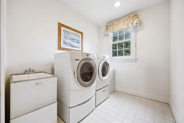 a utility room with dryer and washer
