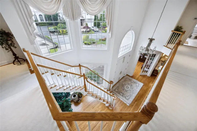 a view of staircase with large window