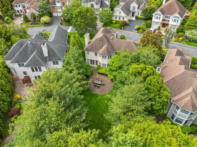 a picture of a white wall with a white bench