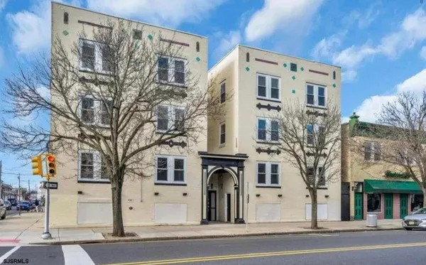 a view of a building with a street