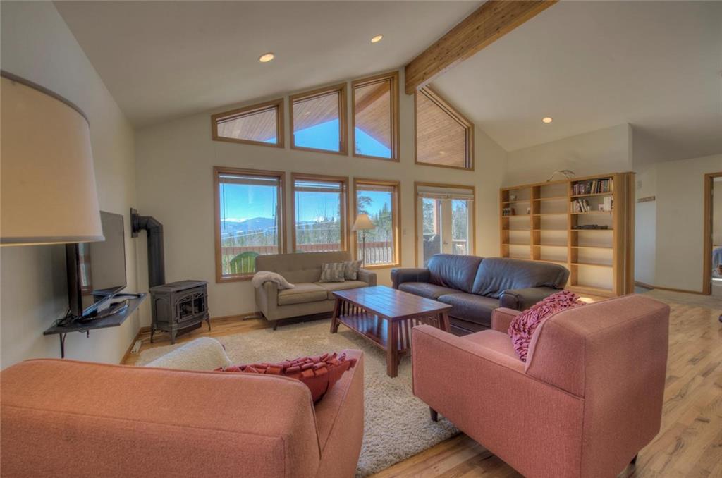 47 Spring Beauty Drive Silverthorne, CO 80498 - Photo 11 of 23 a living room with furniture and a flat screen tv