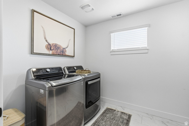 596 South Meade Street Mapleton, UT 84664 - Photo 14 of 38 Laundry area with independent washer and dryer and light marble finish floors
