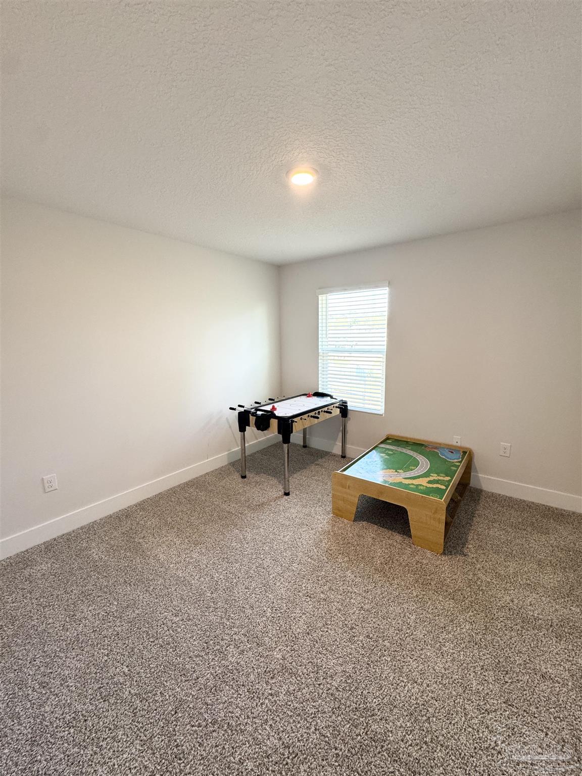 3315 Garganey Road Pace, FL 32571 - Photo 25 of 52 a room with furniture and window