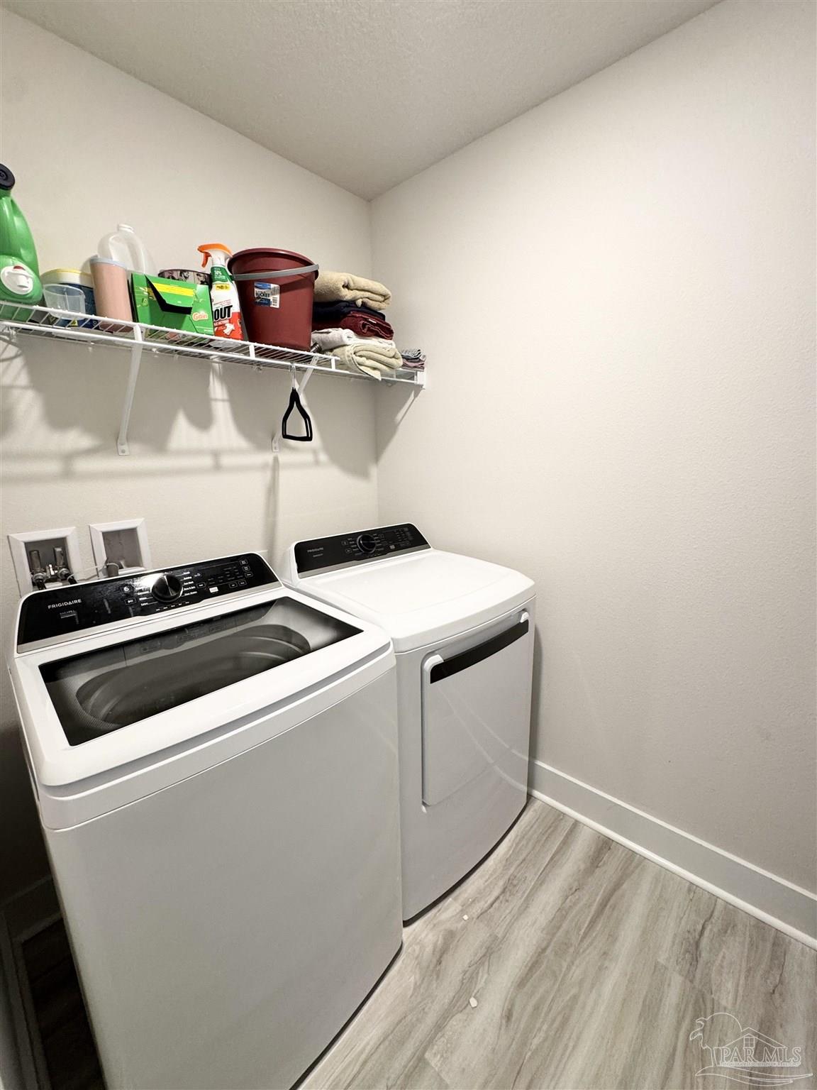 3315 Garganey Road Pace, FL 32571 - Photo 36 of 52 a utility room with dryer and washer