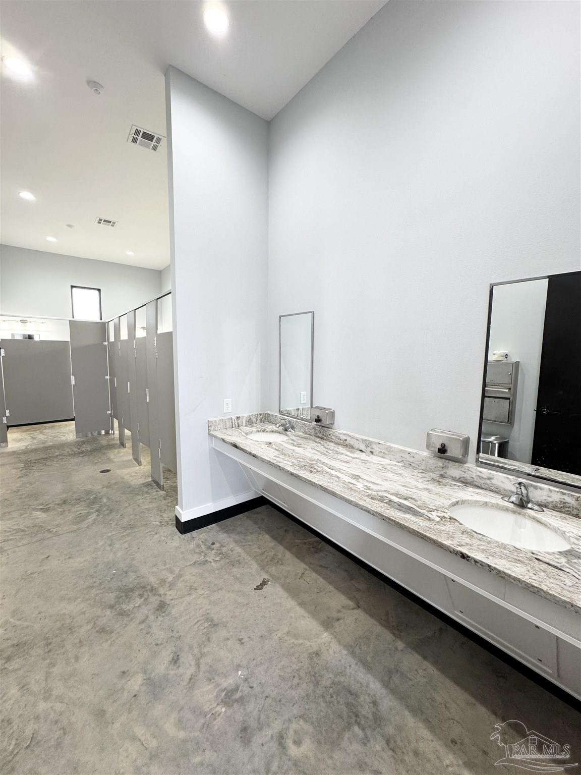3315 Garganey Road Pace, FL 32571 - Photo 51 of 52 a bathroom with a granite countertop sink and a mirror