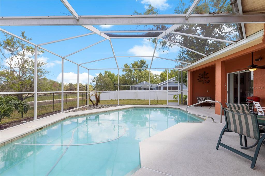 3051 Waterfall Drive Spring Hill, FL 34608 - Photo 2 of 74 a view of a indoor swimming pool