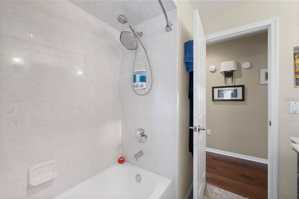 3051 Waterfall Drive Spring Hill, FL 34608 - Photo 34 of 74 a bathroom with a bathtub and shower