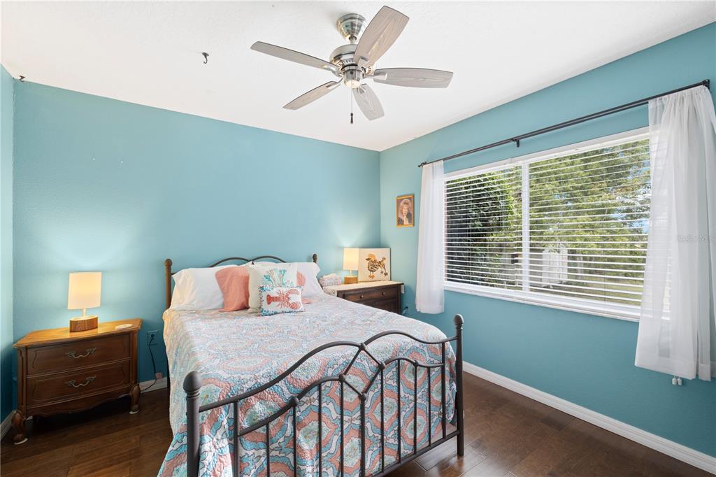 3051 Waterfall Drive Spring Hill, FL 34608 - Photo 35 of 74 a bedroom with a bed and a window