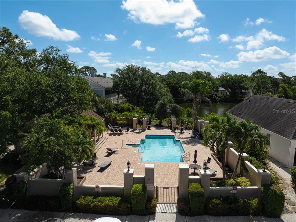 103 Bishopscourt Road Osprey, FL 34229 - Photo 29 of 55 an aerial view of a house with garden space and lake view