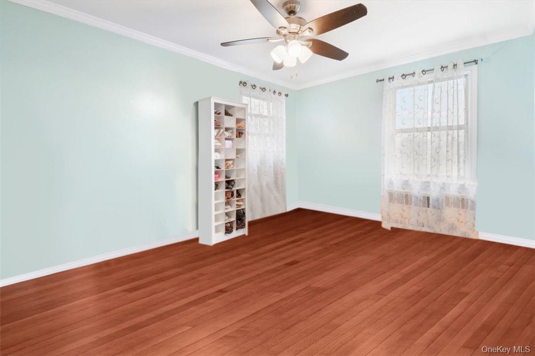 2 Soundview Avenue, Unit 2D White Plains, NY 10606 - Photo 11 of 16 wooden floor in an empty room with a window