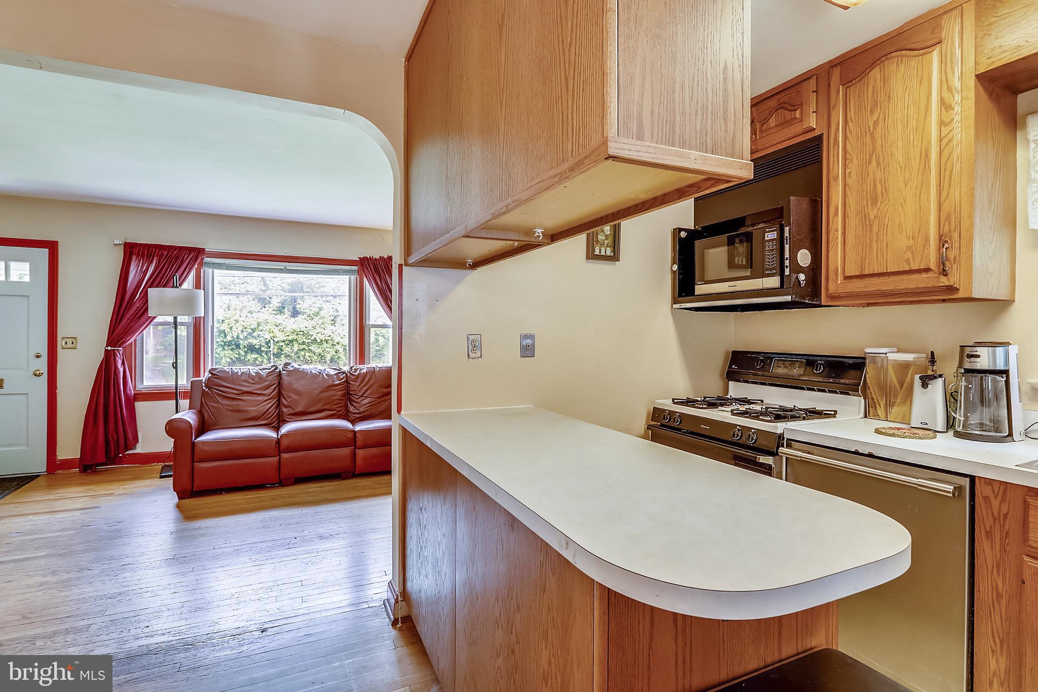 11509 Newport Mill Road Silver Spring, MD 20902 - Photo 22 of 31 Kitchen with breakfast bar