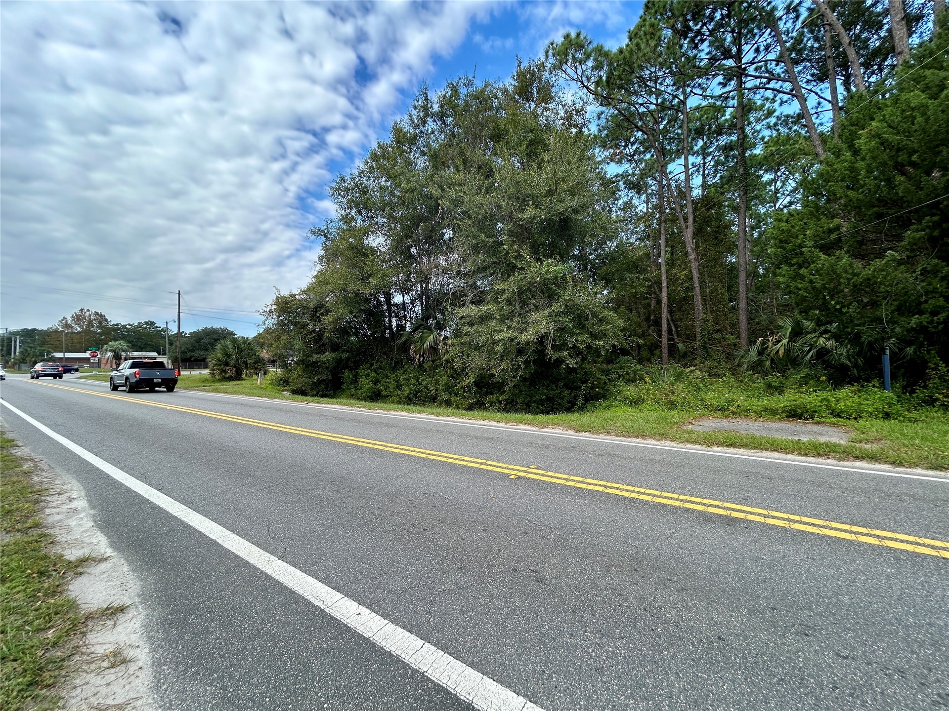 0 Goodbread Road Yulee, FL 32097 - Photo 11 of 19 a view of street with a small yard