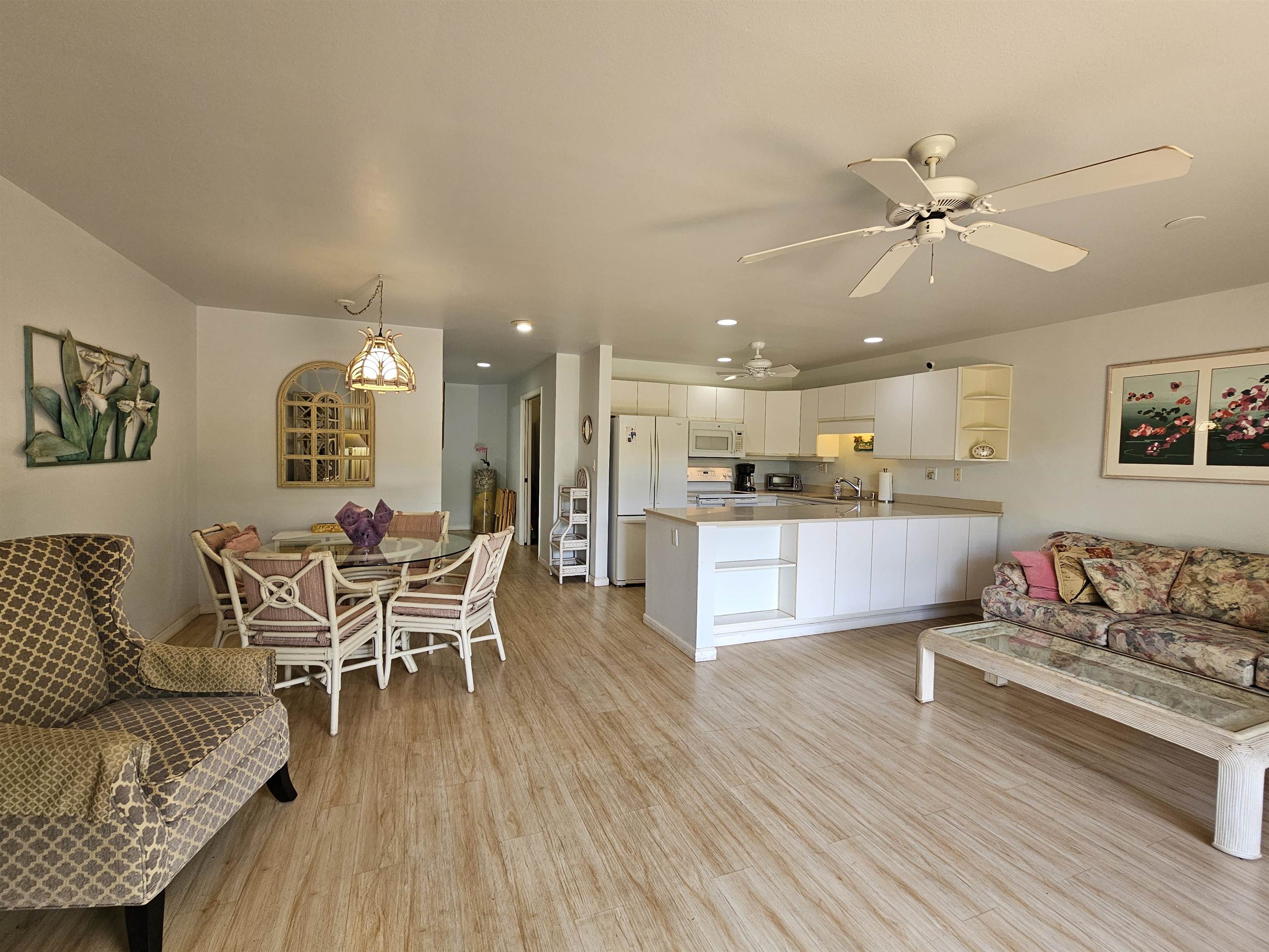 2777 South Kihei Road, Unit K107 Kihei, HI 96753 - Photo 1 of 50 a living room with furniture and kitchen view