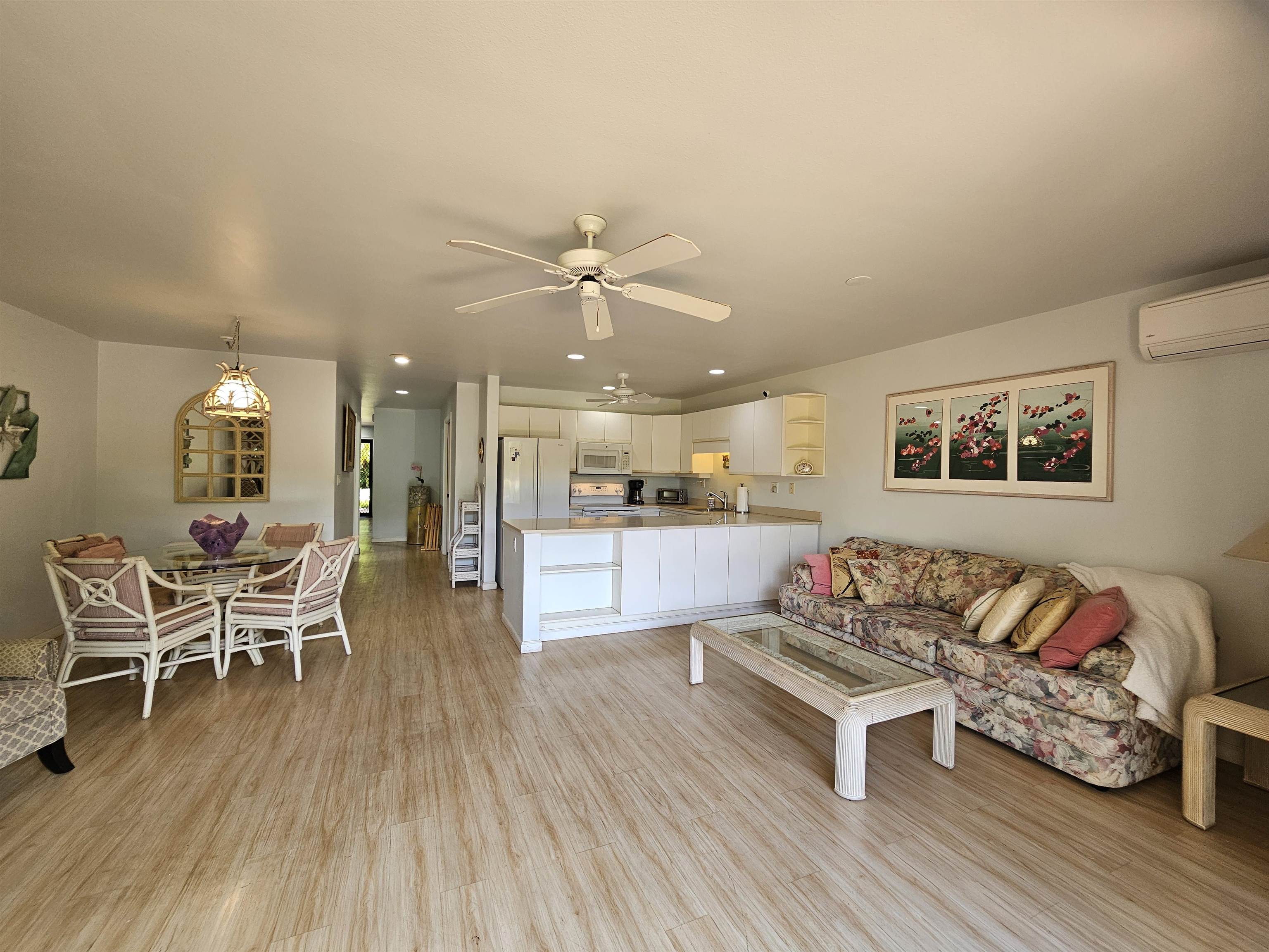 2777 South Kihei Road, Unit K107 Kihei, HI 96753 - Photo 11 of 50 a living room with furniture and wooden floor