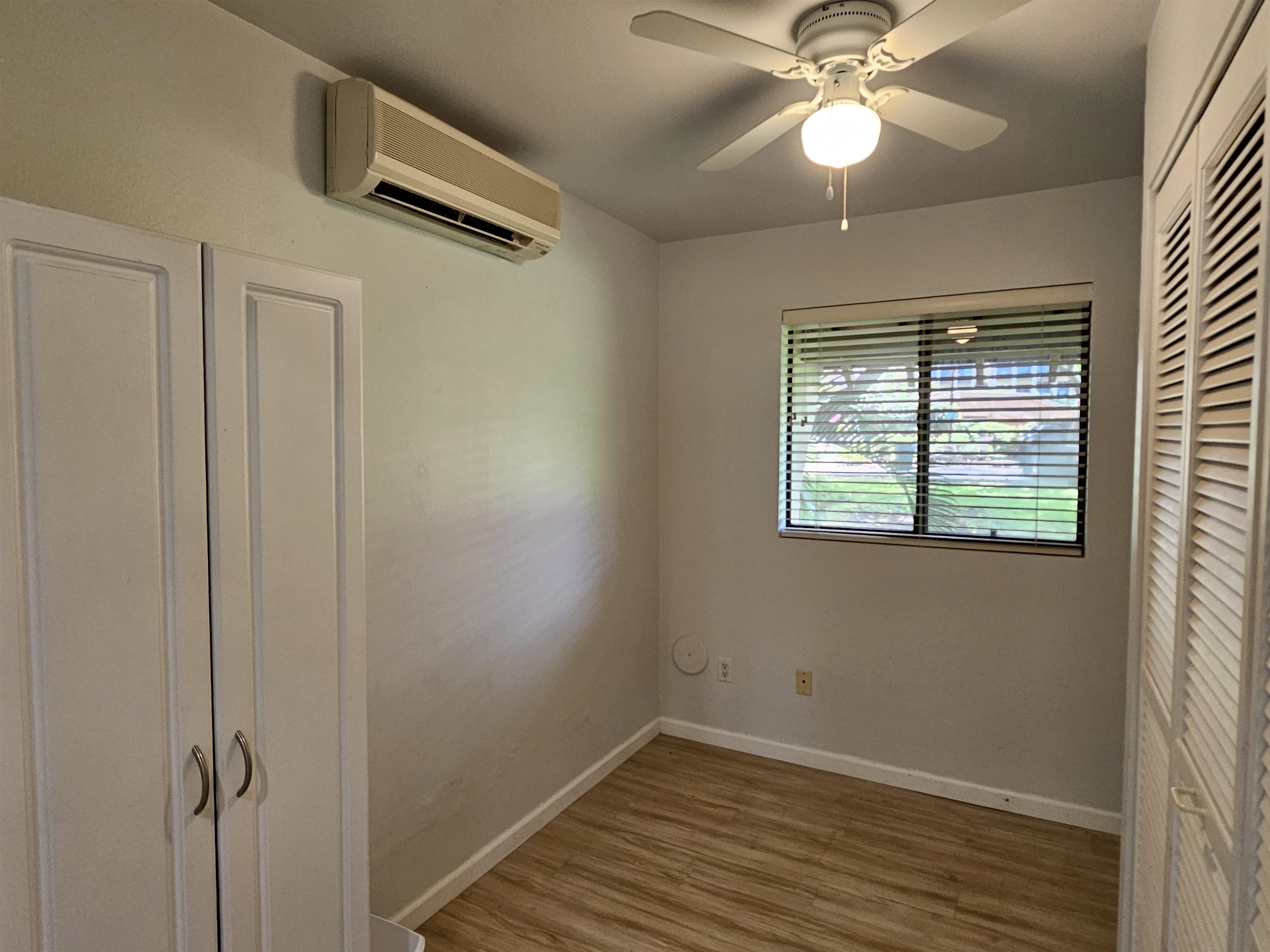 2777 South Kihei Road, Unit K107 Kihei, HI 96753 - Photo 28 of 50 a view of a livingroom with a fan and wooden floor