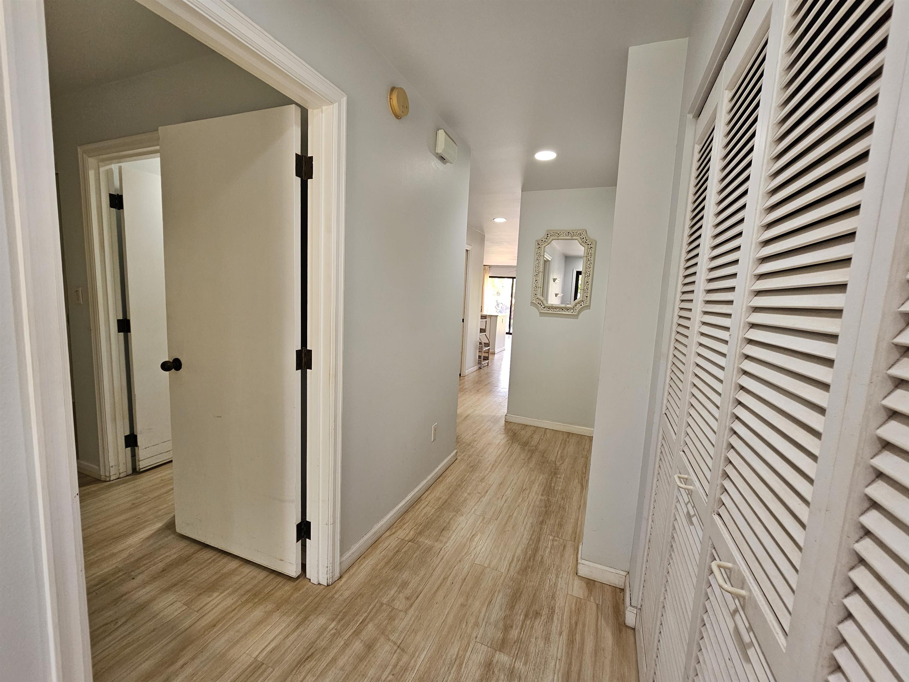 2777 South Kihei Road, Unit K107 Kihei, HI 96753 - Photo 29 of 50 a view of a hallway with wooden floor and staircase