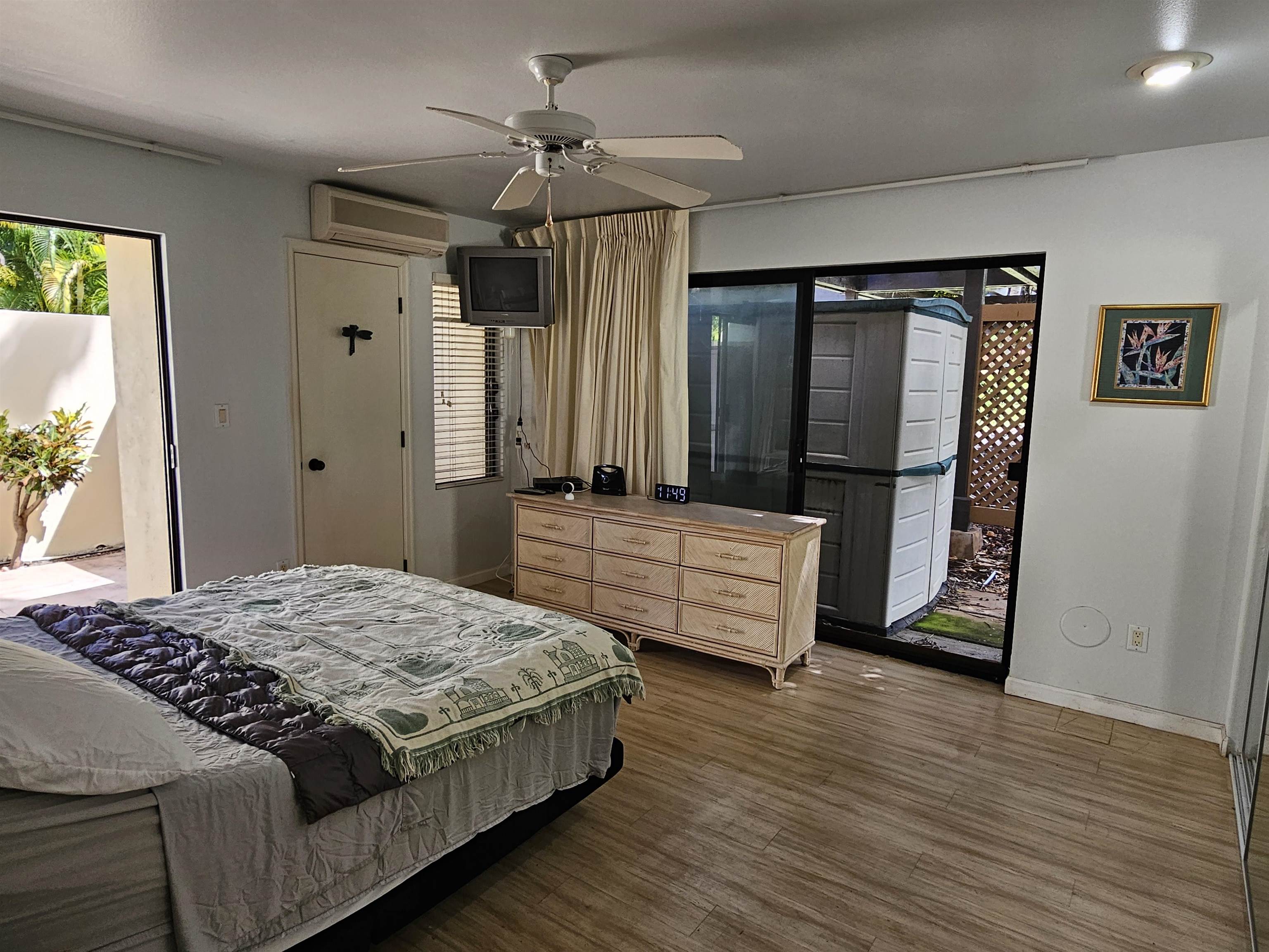 2777 South Kihei Road, Unit K107 Kihei, HI 96753 - Photo 36 of 50 a bedroom with a bed dresser and a window