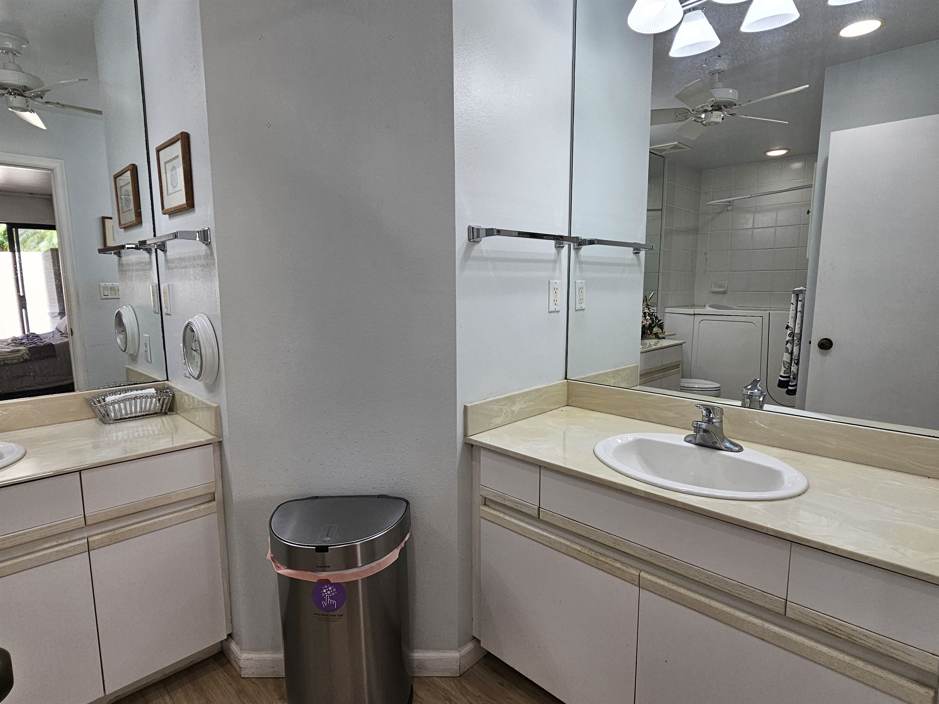 2777 South Kihei Road, Unit K107 Kihei, HI 96753 - Photo 44 of 50 a bathroom with a sink toilet and a mirror