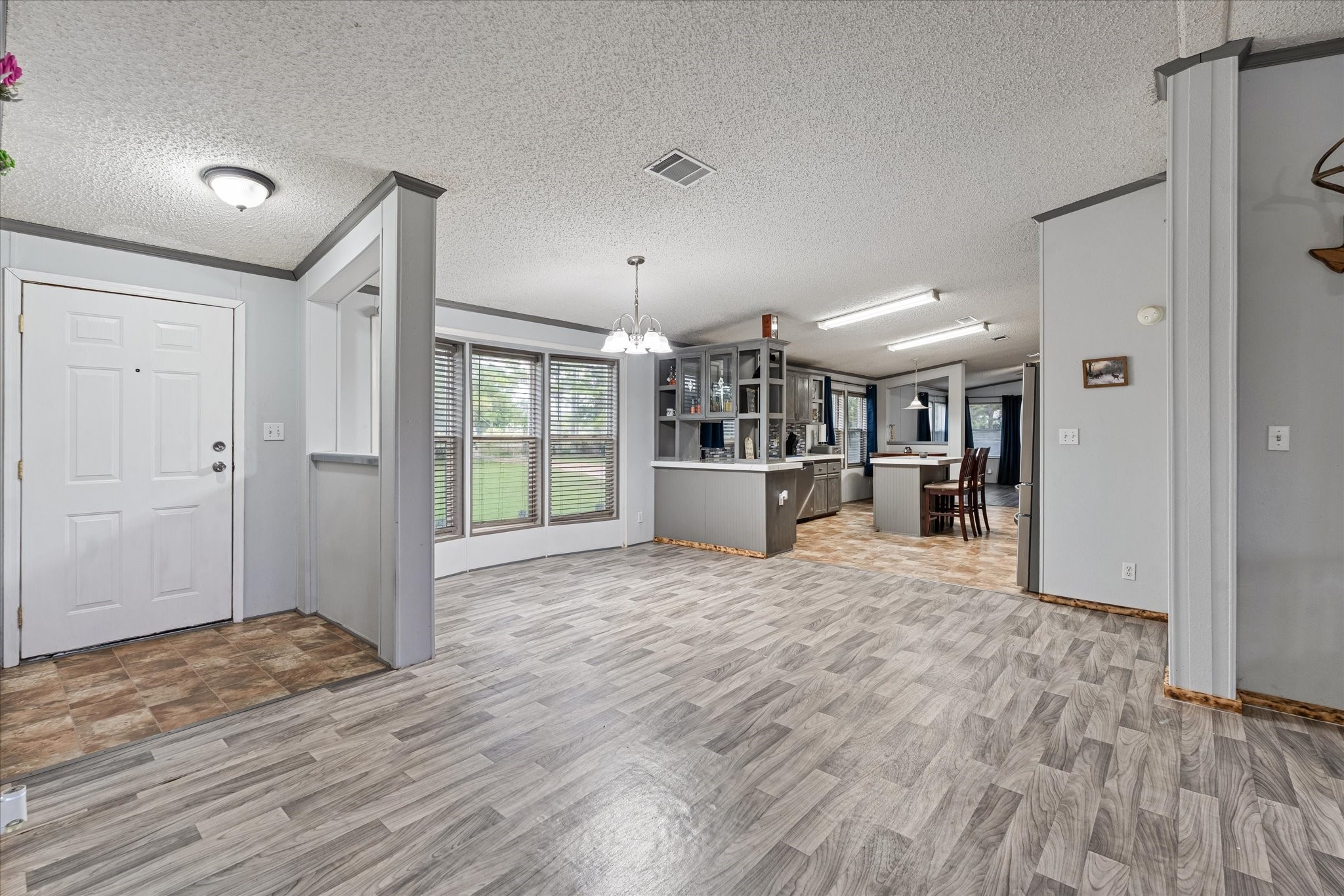 1715 Meyer Road Beasley, TX 77417 - Photo 8 of 41 View looking towards the front entrance, into the formal dining room and kitchen.