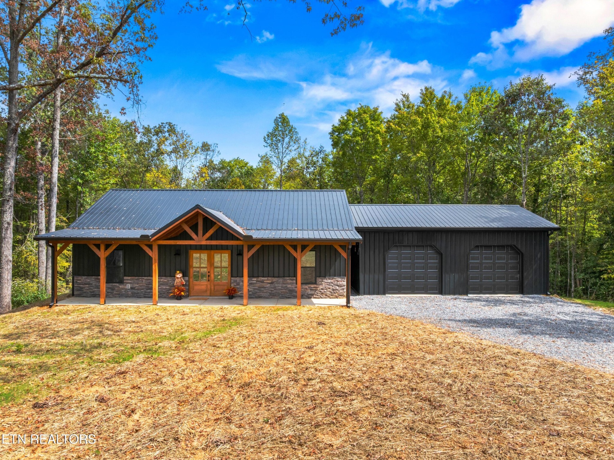 146 Fancher Road Newport, TN 37821 - Photo 2 of 41 a front view of a house with a yard