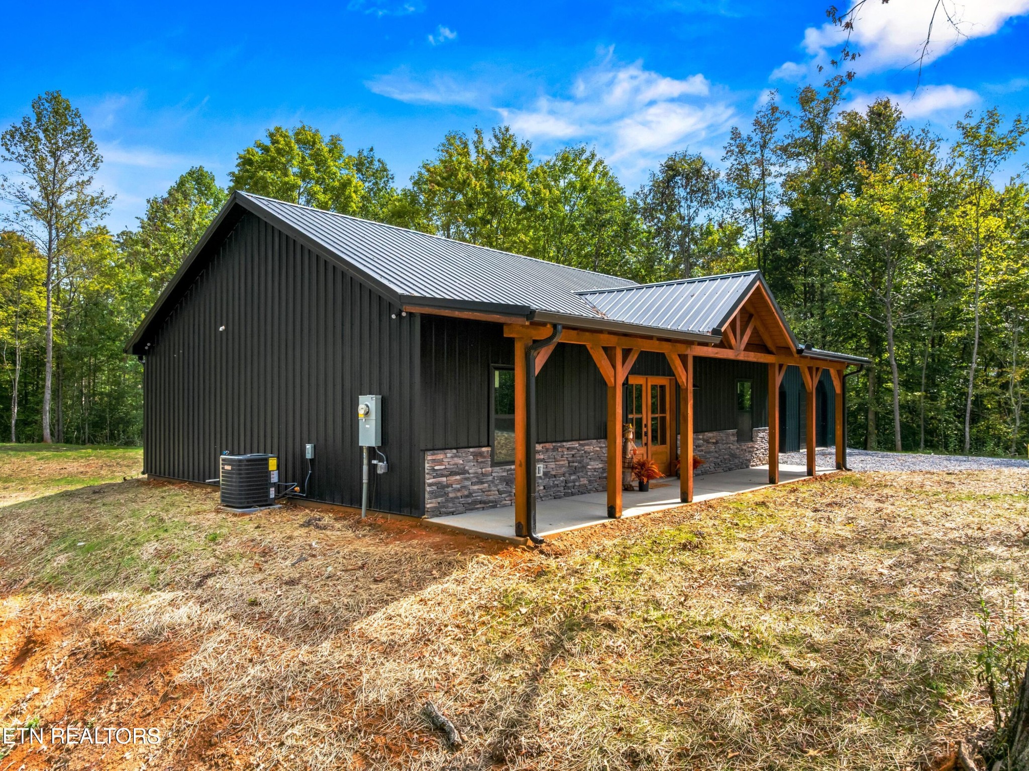 146 Fancher Road Newport, TN 37821 - Photo 33 of 41 a view of a house with a yard outdoor seating and yard