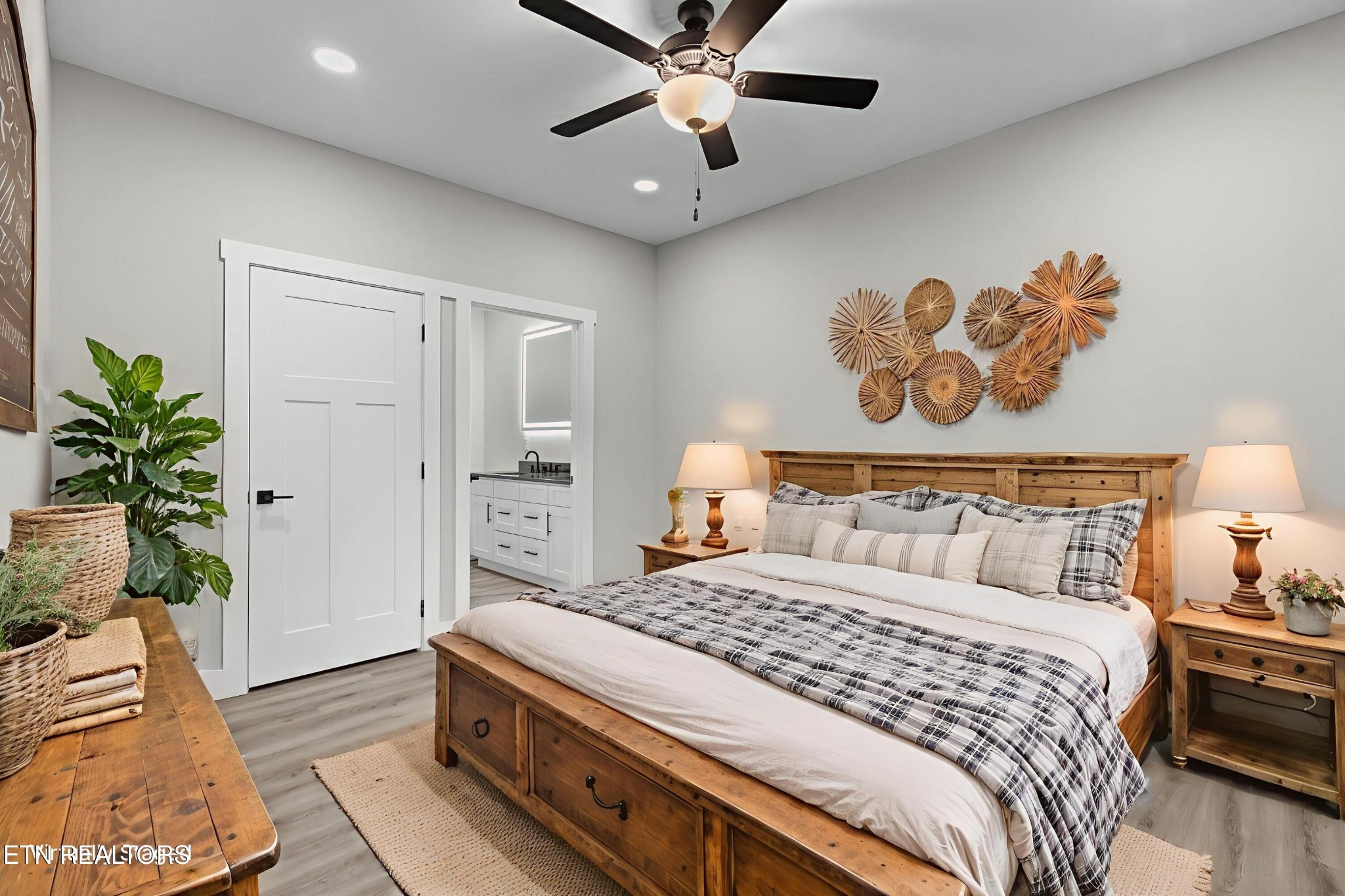 146 Fancher Road Newport, TN 37821 - Photo 9 of 41 a bedroom with a bed and a potted plant