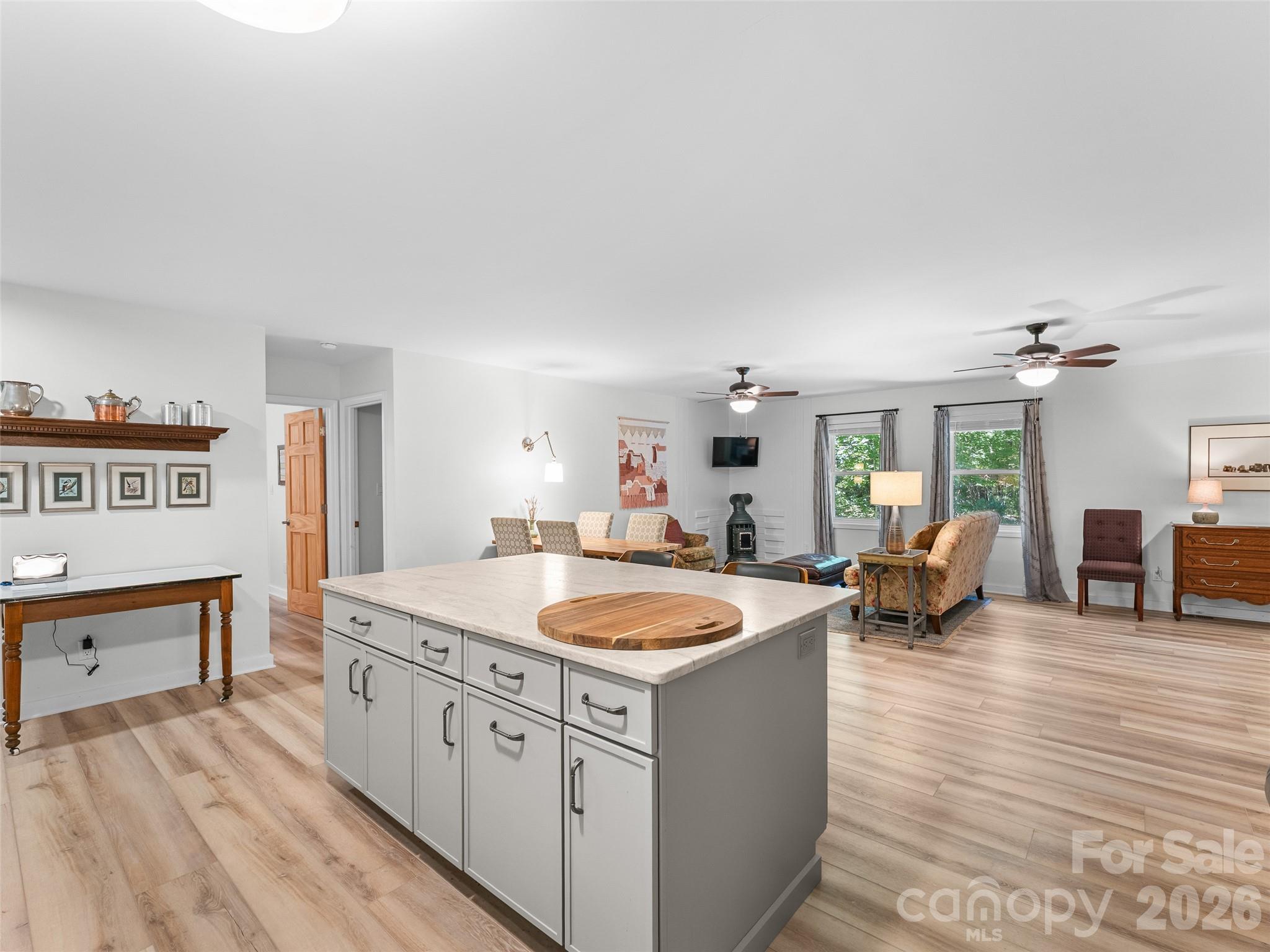 1756 Happy Acres Road Brevard, NC 28712 - Photo 19 of 35 a kitchen with sink refrigerator and stove