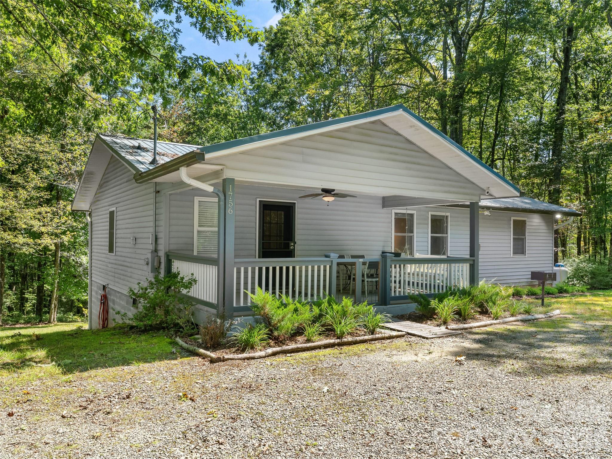 1756 Happy Acres Road Brevard, NC 28712 - Photo 2 of 35 front view of a house and a yard
