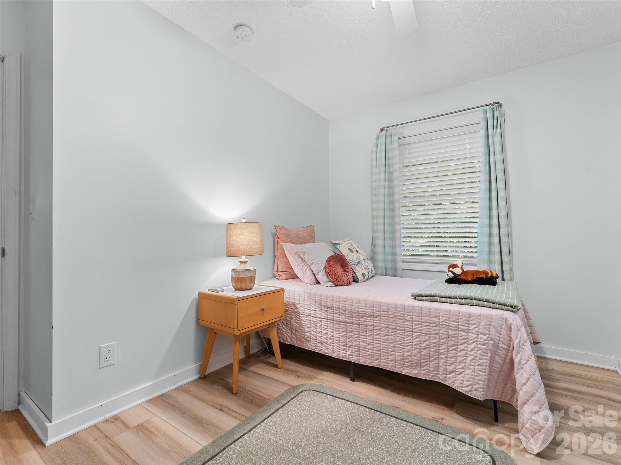 1756 Happy Acres Road Brevard, NC 28712 - Photo 25 of 35 a bedroom with a bed and window