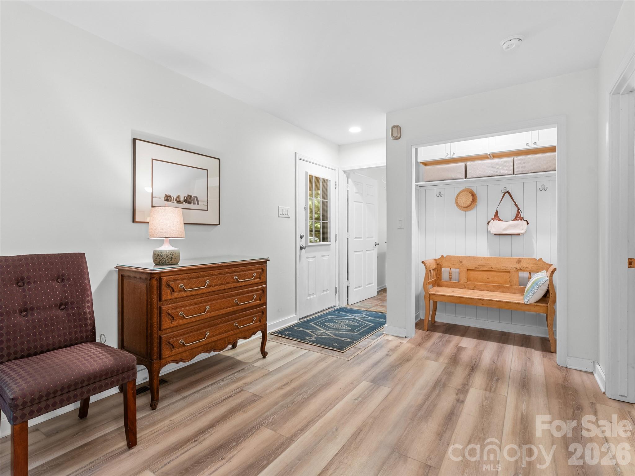1756 Happy Acres Road Brevard, NC 28712 - Photo 7 of 35 a bedroom with furniture and a rug
