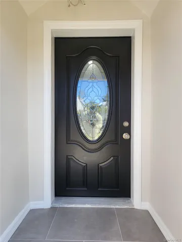 a stone house with a door