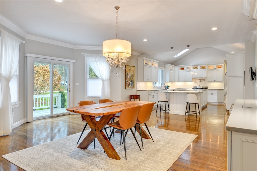 22 Forest Lane, Unit 22 Scituate, MA 02066 - Photo 5 of 27 a view of a dining room with furniture window and wooden floor