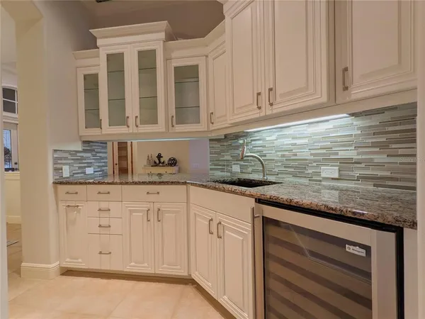 a living room with furniture and window