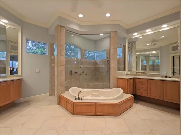 a white toilet sitting next to a window