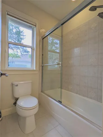 a bedroom with a bed and a cabinets